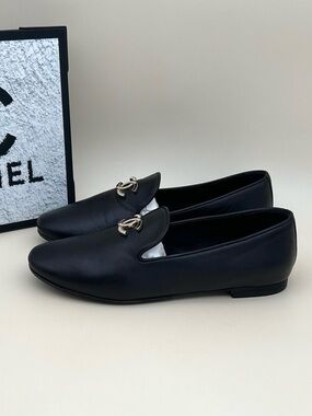 CHANEL Black Leather Slip-On Loafers with Silver CC Chain